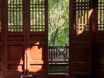 Natural sunlight streaming through a window onto wooden floor.